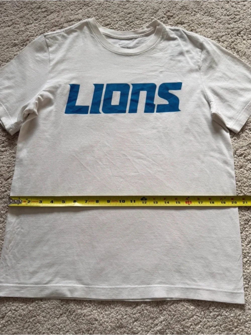 Nike White Short-Sleeve 'LIONS' Graphic Tee with Blue Logo
